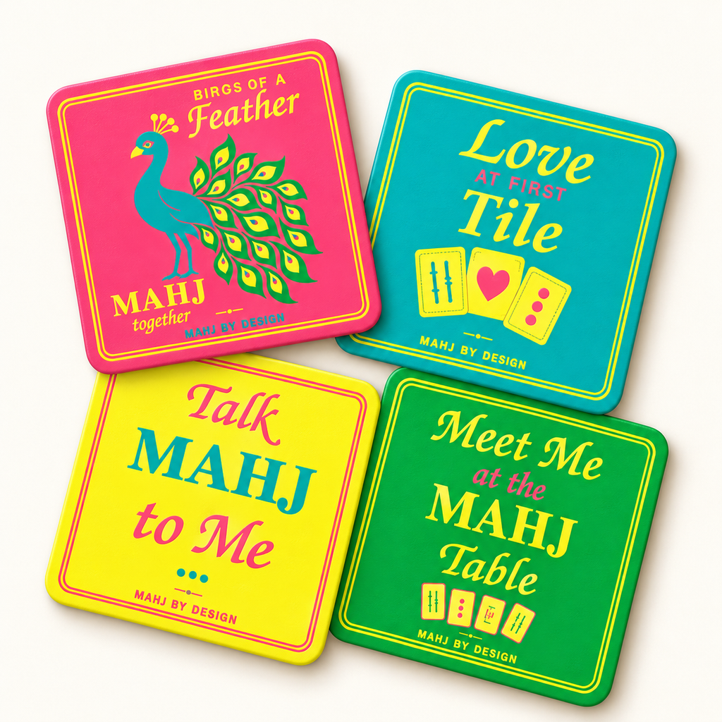 Four Signature mahjong coasters in pink, turquoise, yellow and green on the collection’s warm ivory background. Digital product rendering.