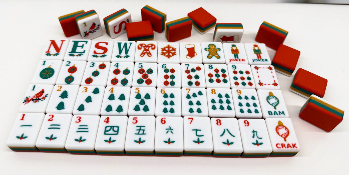 Christmas mahjong sample tile layout showing the actual tile artwork and red, green and gold edges.