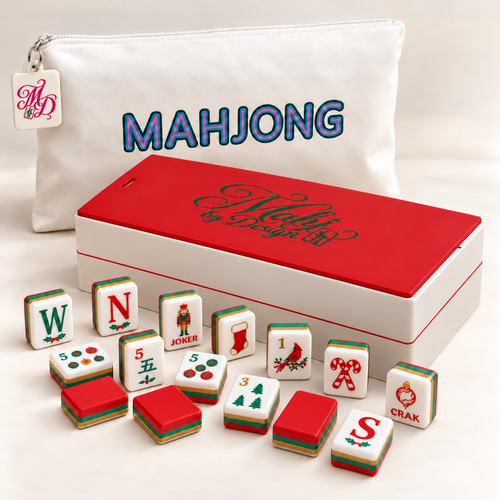 Christmas mahjong tiles with red-lidded storage box and tagged white bag. Digital product rendering.